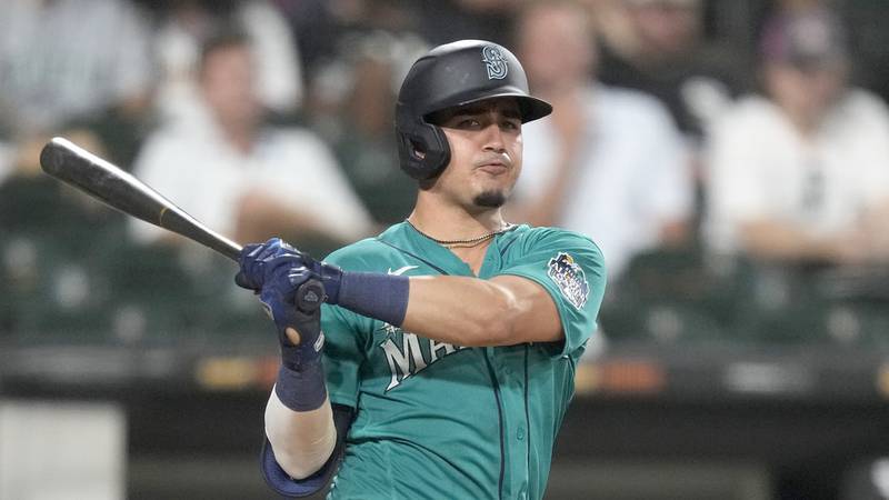 Seattle Mariners' Josh Rojas watches the ball sail foul during a baseball game against the...