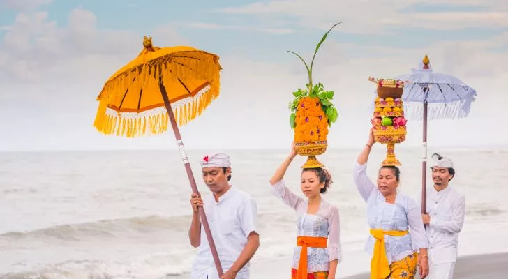 Balinese people on the beach celebrating Nyepi