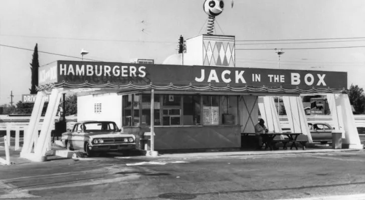 An old black and white photo of a Jack in the Box restaurant