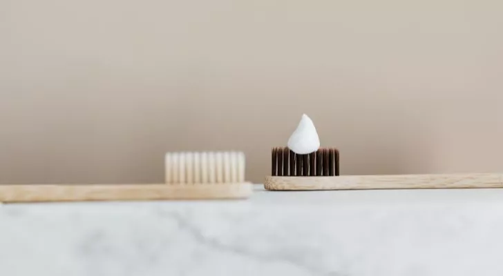 Two hard bristle toothbrushes
